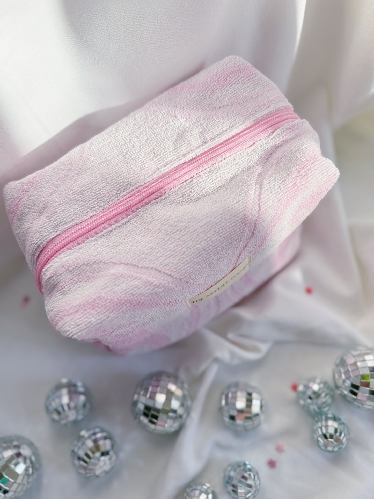 Trousse matelassée - serviette rose pale à motifs